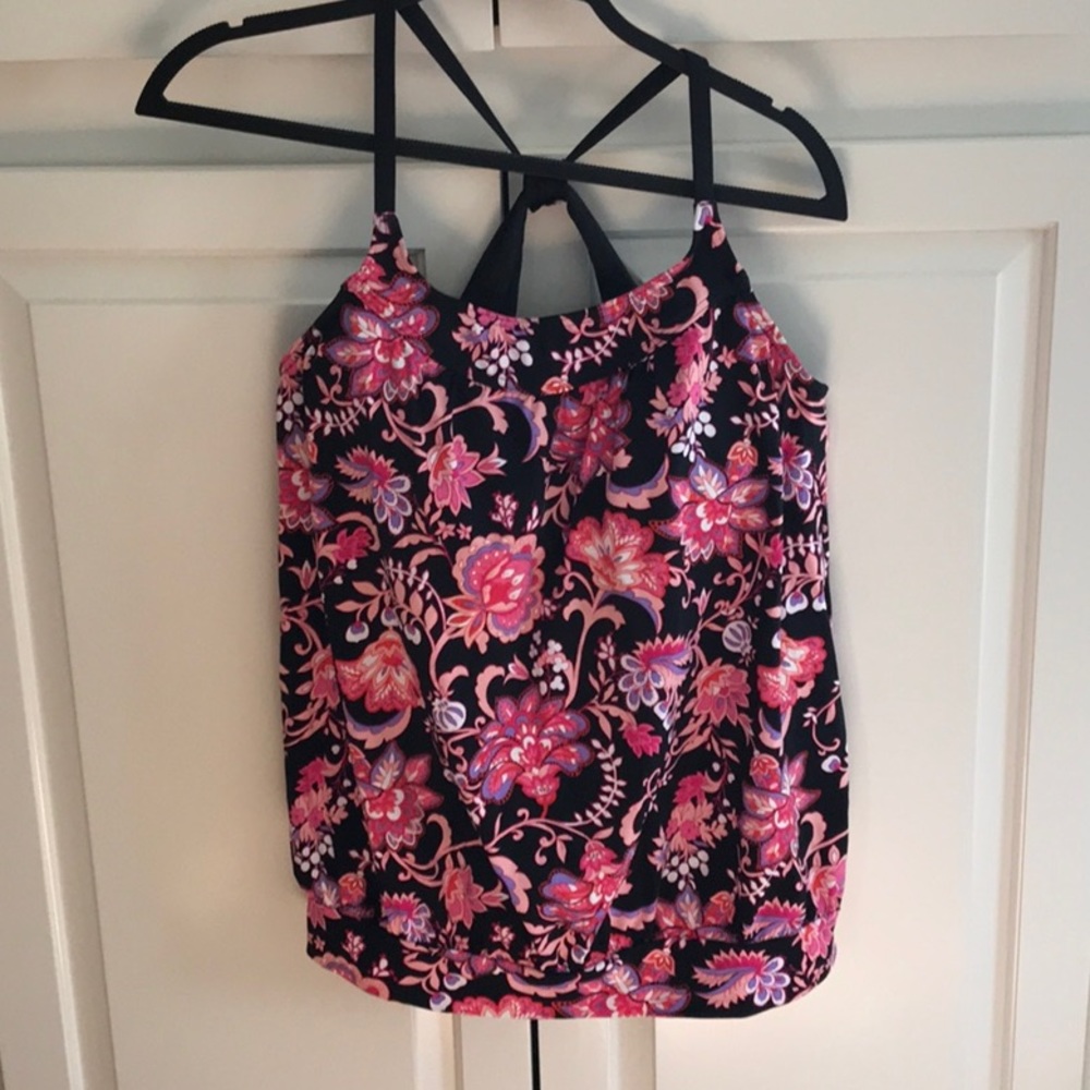Two piece bathing suit. Never worn! Tankini style. Pinks and black.